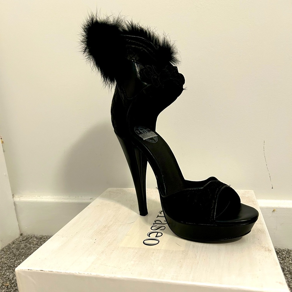 Brand New in box platform heels with fur trim detail.